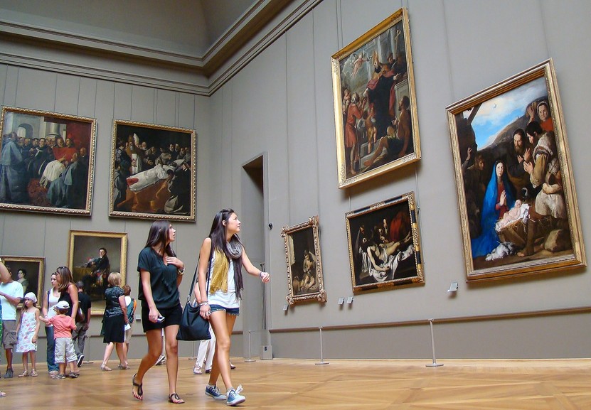 Louvre museum Paris France tourist attractions paintings attract woman