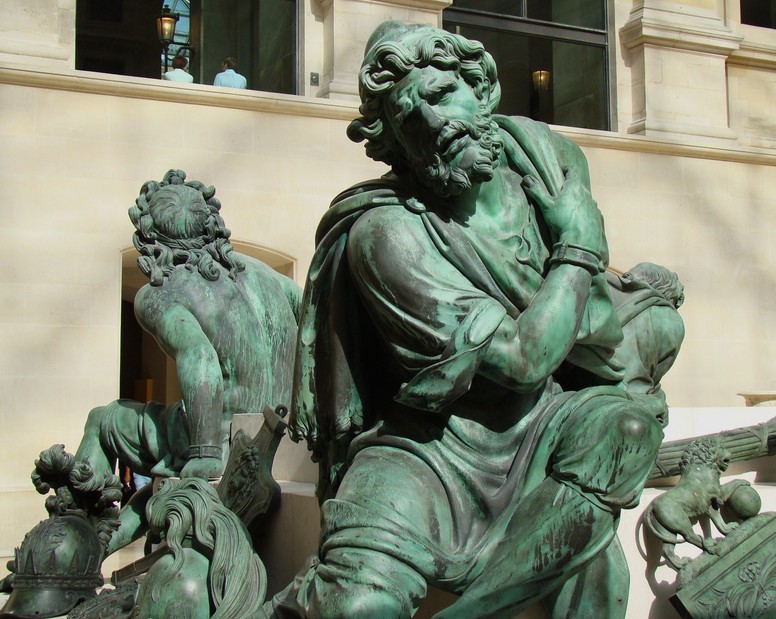 Musée du louvre Paris France Statues de bronze Quatre captifs dits aussi des Quatre Nations vaincues sculpteur français Desjardins