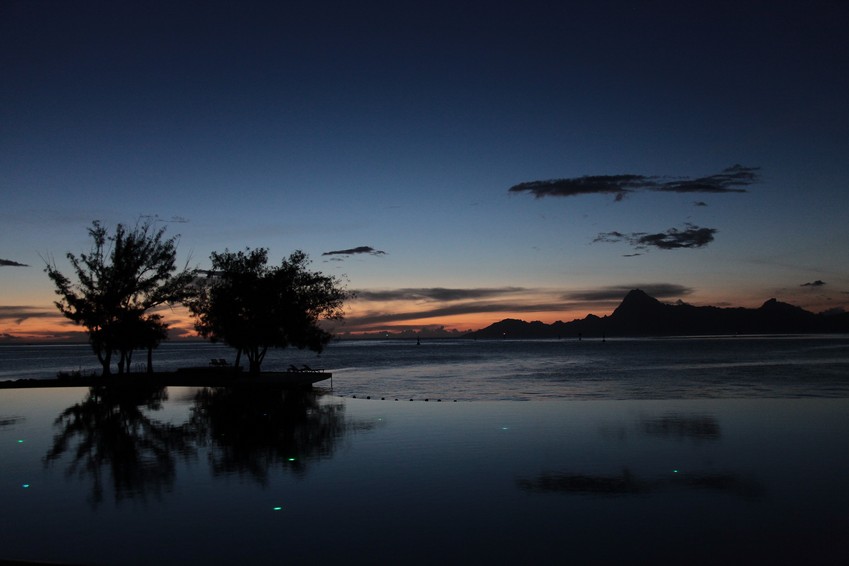 Manava Suite Resort Tahiti swimming pool reflect sundown
