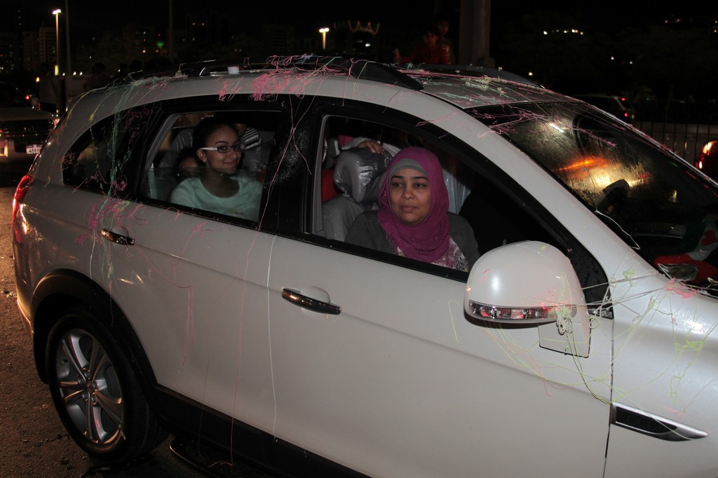 women in a car abu dhabi corniche national day 40th anniversary 