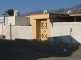 Sultanat d'Oman  Dibba sous le soleil porte metalique