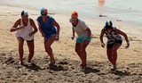 Women in line for a race in the sand Torquay Beach Surf Competition Australia Victoria