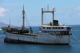 ship french polynesia cargo rusty white hull