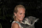 Tourist attraction lone pine koala sanctuary blond girl with blue eyes