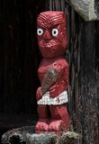 Ugly Moari statue in village New Zealand north island